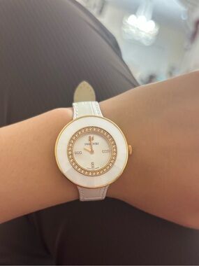 Swarovski Rose Gold Watch with Cream Leather Strap and Floral Caseback